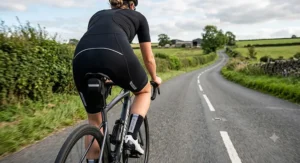 High-visibility reflective details on the rear of women's bib shorts for safety on British roads.