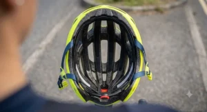Top view showing the strategic cooling vents on a breathable women's road cycling helmet for summer riding.