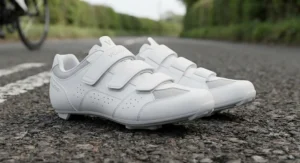 White men's entry-level road cycling shoes on tarmac, ideal for club rides and sportives