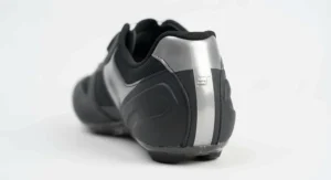 Rear profile highlighting the ergonomic heel cup and reflective detailing on premium clipless road cycling shoes.
