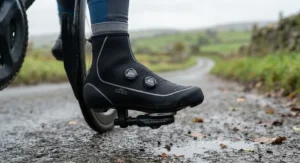Waterproof overshoes fitted over BOA dial road cycling shoes during a damp training ride in typical British weather.