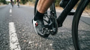 Close-up of budget BOA road shoes securely clipped into clipless bicycle pedals