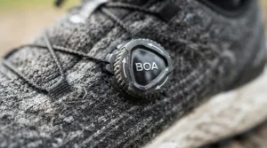 Macro close-up of the micro-adjustable dial and lace on budget BOA road shoes