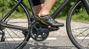 Close-up of pedal stroke alignment using SPD-SL cleats for knee comfort on a road bike