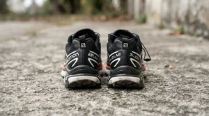 Rear angle of stiff carbon sole road shoes for racing highlighting ankle support
